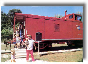 This Restored 1901 Missouri Pacific Depot -  Red Caboose is the home of the Children's Discovery Center.
